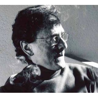 Grayscale side portrait of man and dog