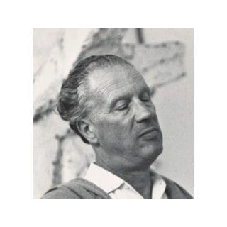Man with closed eyes and relaxed expression.