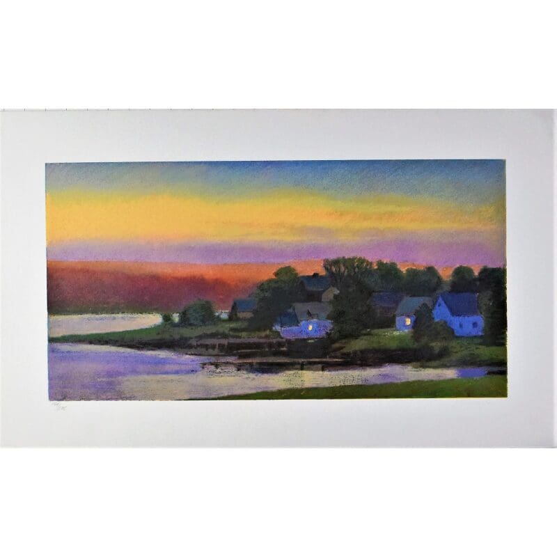 Colorful sunset over houses near water.