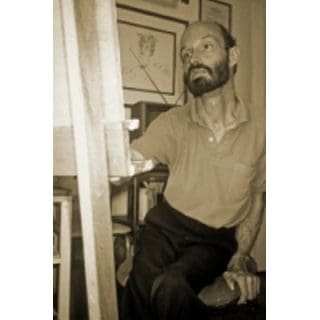 Artist painting at an easel, monochrome image.