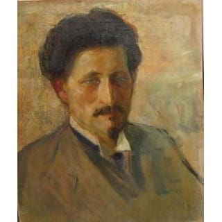 Portrait of a man with dark hair.